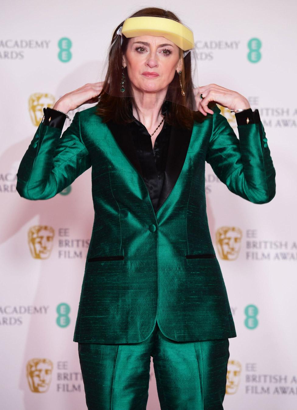 Bafta chief executive Amanda Berry sported a visor on the red carpet