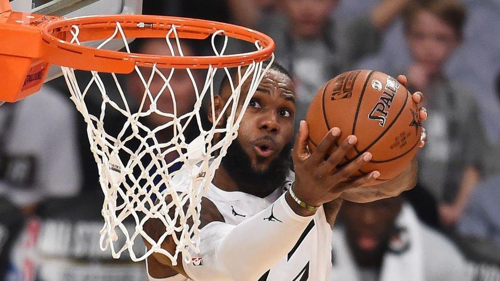 LeBron James dunking