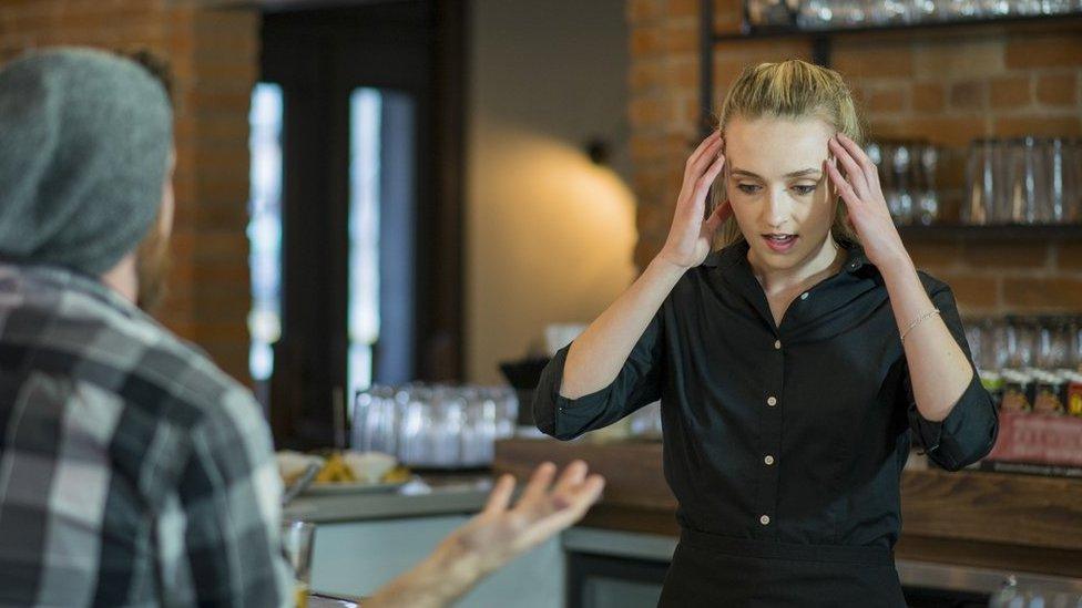 Stressed waitress