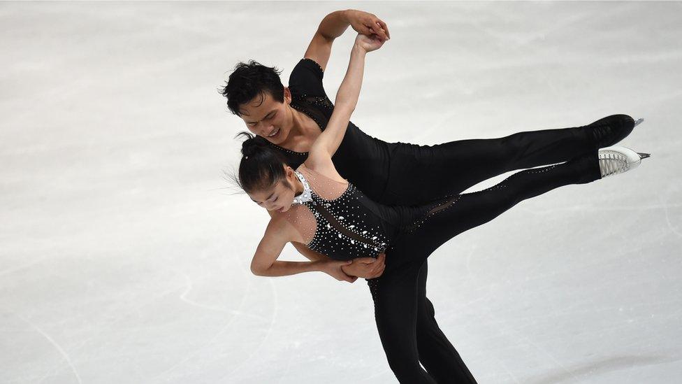 Ju Sik Kim and Tae Ok Ryom (L) of DPR Korea perform