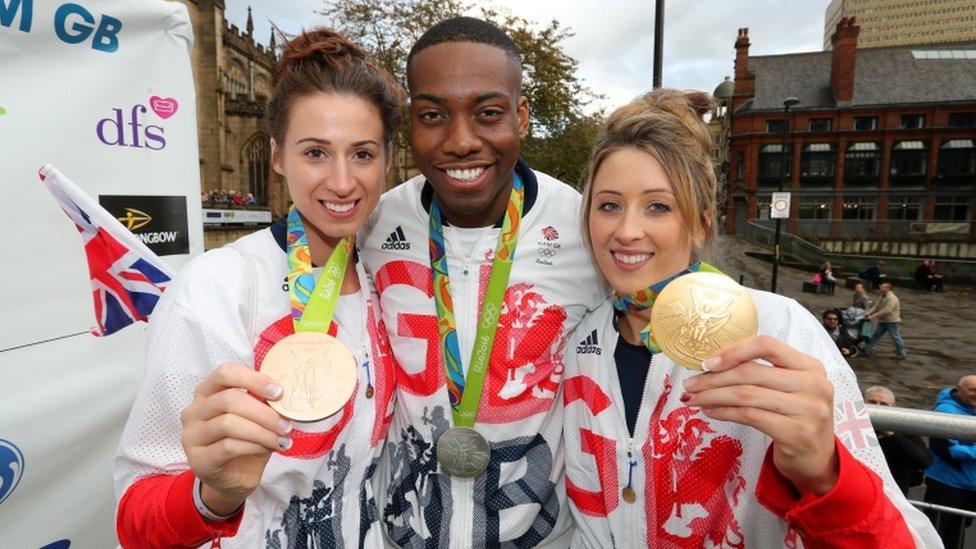 Bianca Walkden (L), Jade Jones (R) pose with Lutalo Muhammad