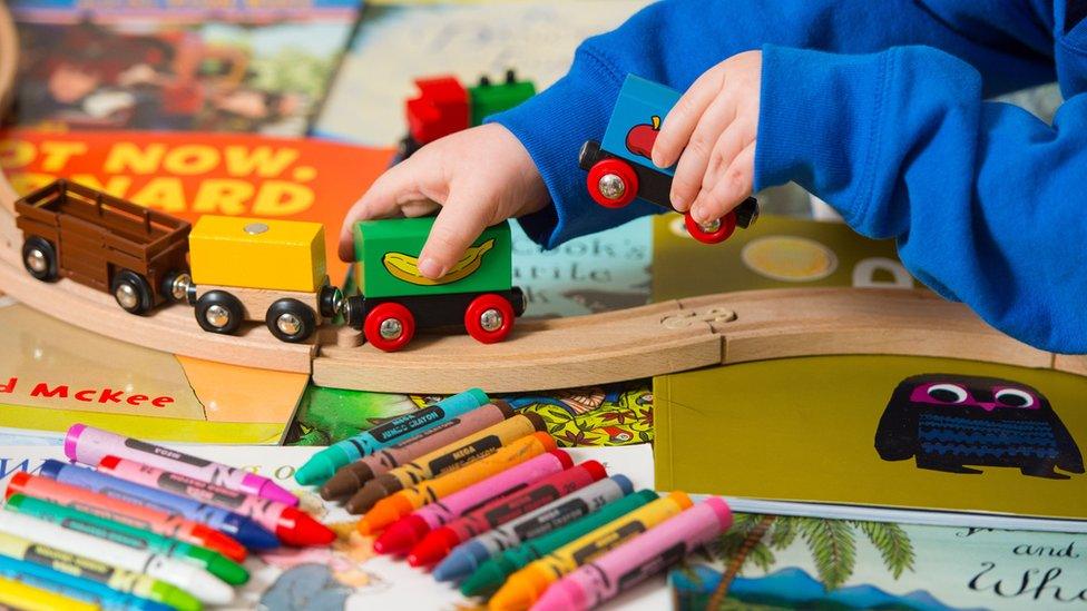 A child playing with toys