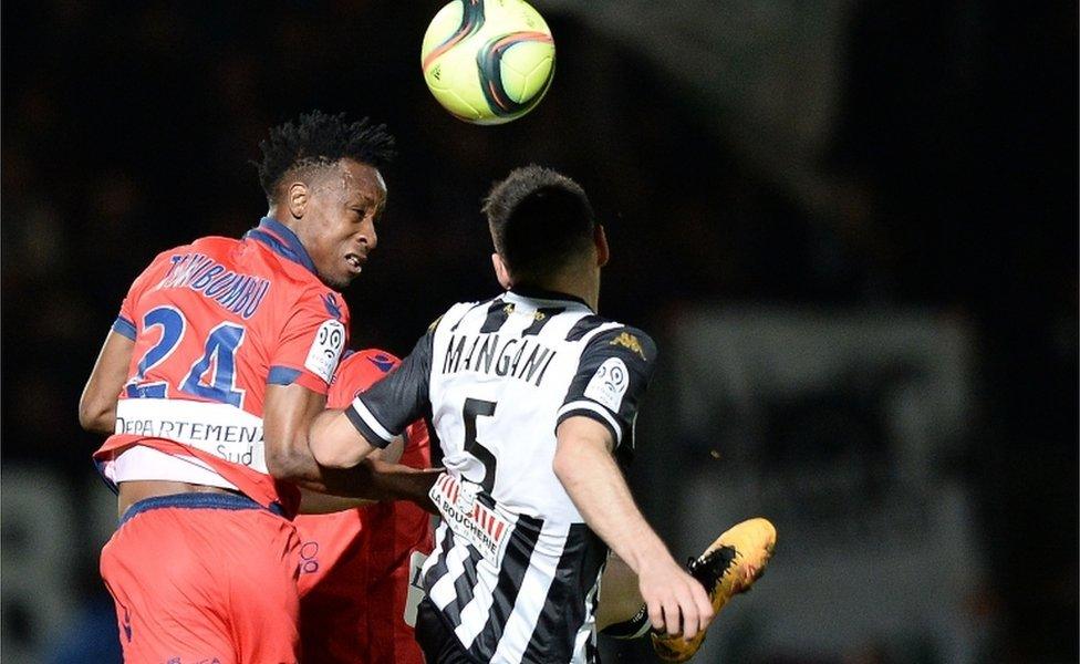 Ajaccio's Congolese forward John Tshibumbu (L) vies with Angers' French midfielder Thomas Mangani during the French L1 football match between Angers and Ajaccio on April 9, 2016 at the Jean Bouin stadium in Angers, western France