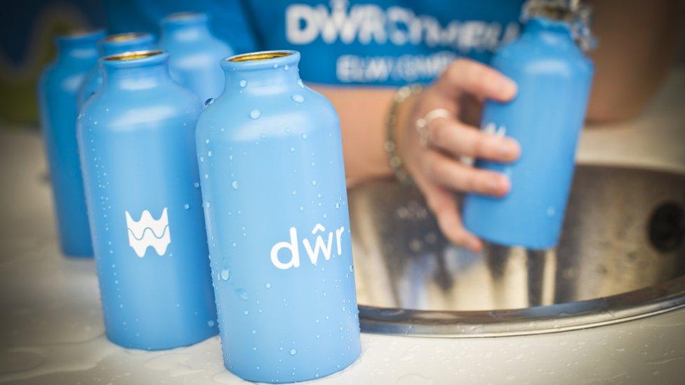 Welsh Water bottles being filled with water at a festival