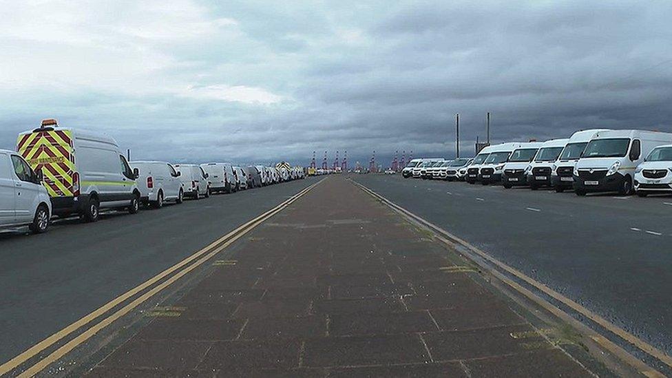 White vans parked on New Brighton promenade