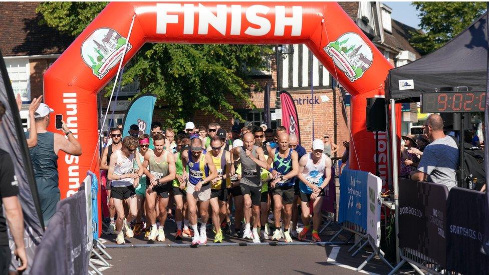 Runners passing the finish line