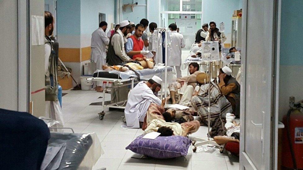 Members of Medecins Sans Frontieres treating injured people in a hospital in Kunduz