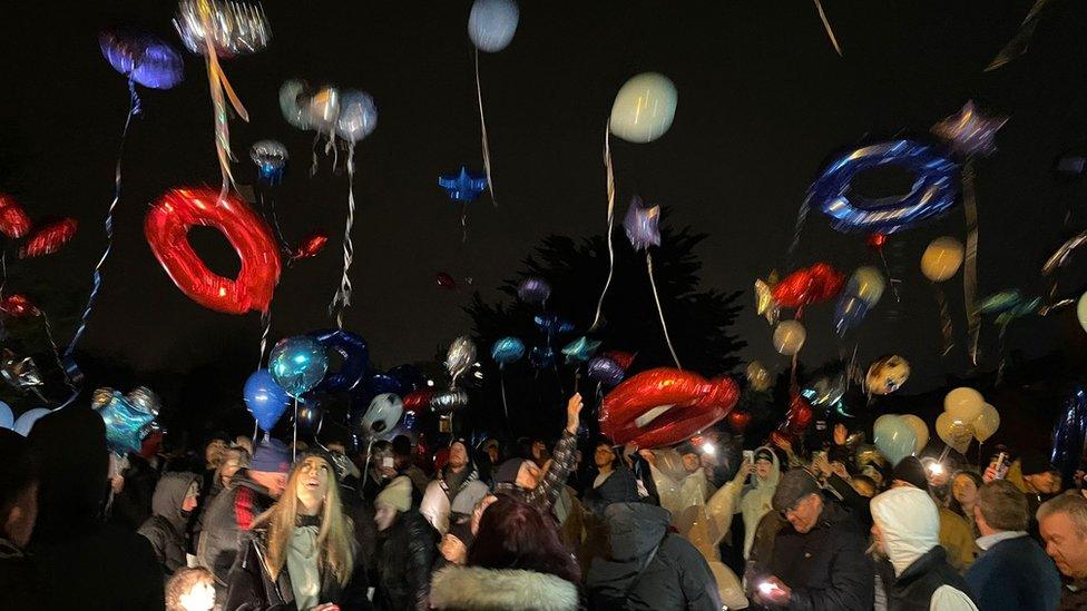 Balloons being released at the vigil