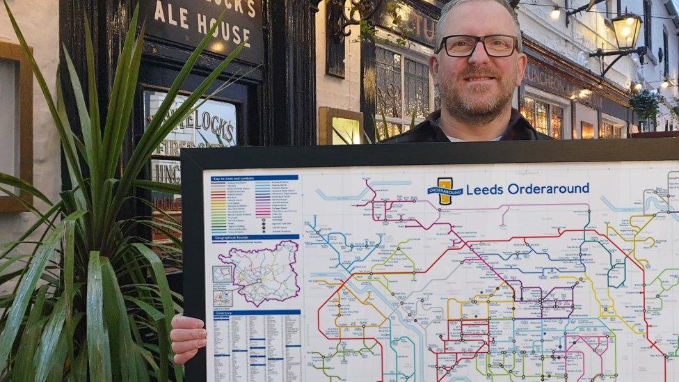 Steven Lovell with his Leeds map