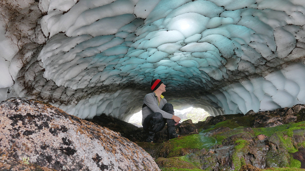 Iain Cameron in a snow tunnel on Beinn Bhrotain