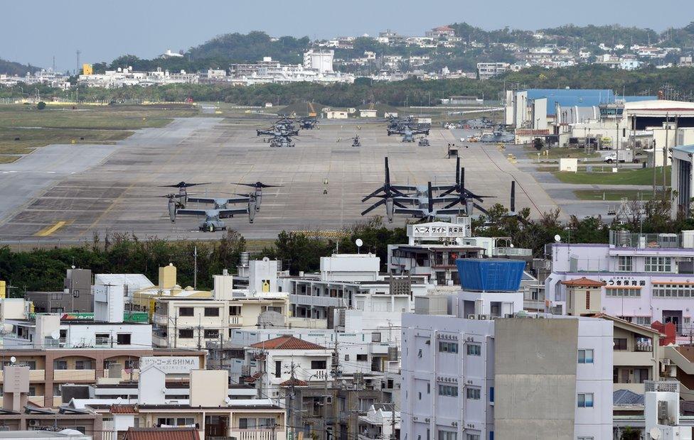 This photo taken on 14 November 2014 shows multi-mission tiltrotor Osprey aircraft at the US Marine's Camp Futenma in a crowded urban area of Ginowan, Okinawa prefecture, ahead of Okinawa's gubernatorial election