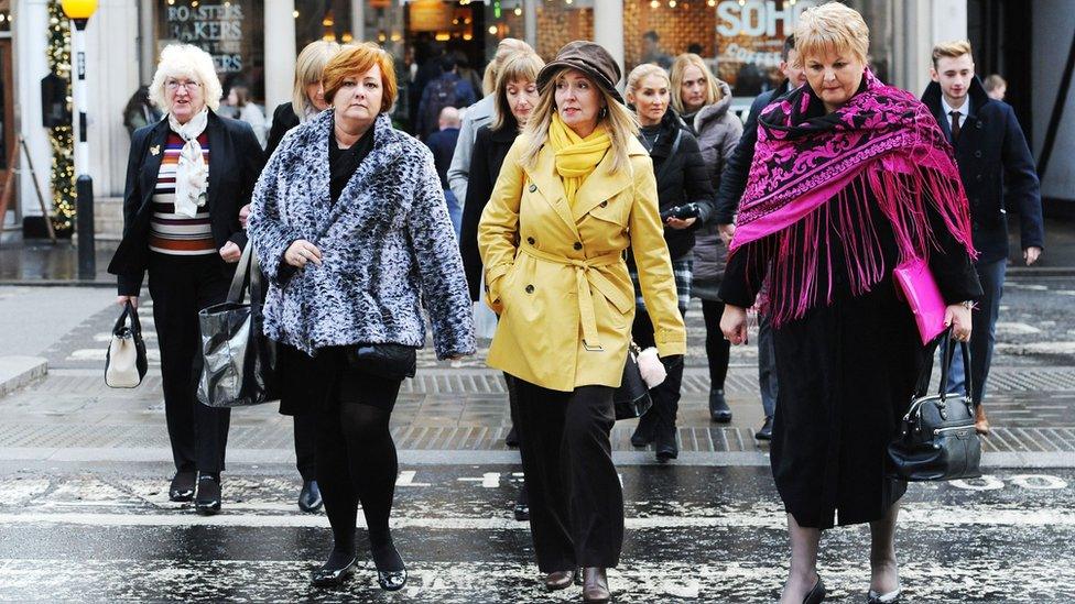 Relatives return after lunch at the Royal Courts of Justice in London, for the inquest into the deaths of 30 Britons in the Tunisia beach terror attack