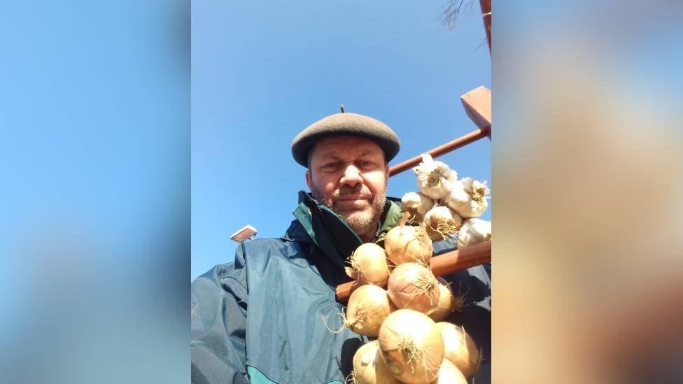 Patrick with his beret and onions