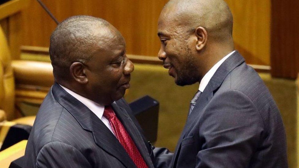 Cyril Ramaphosa (left) embraces Mmusi Maimane (right)