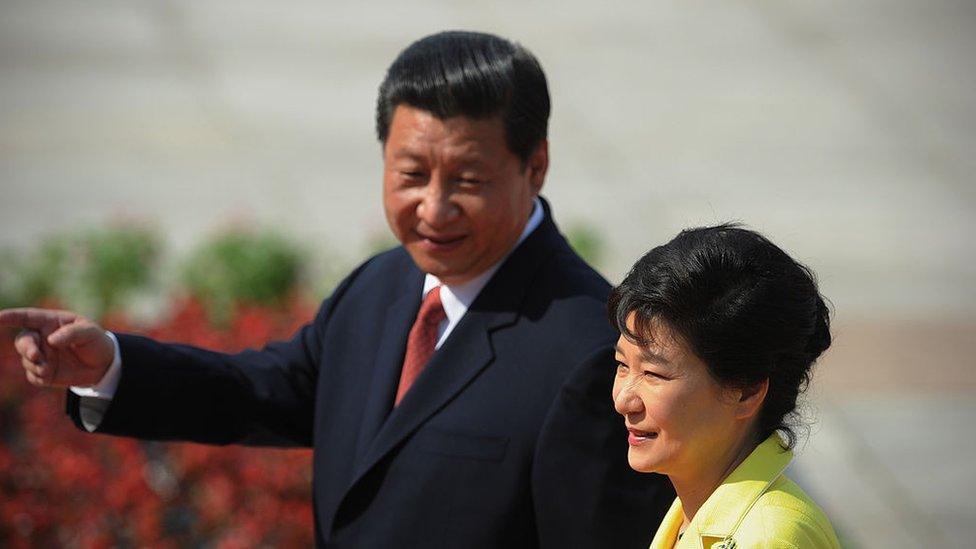 South Korean President Park Geun-Hye (R) and Chinese President Xi Jinping