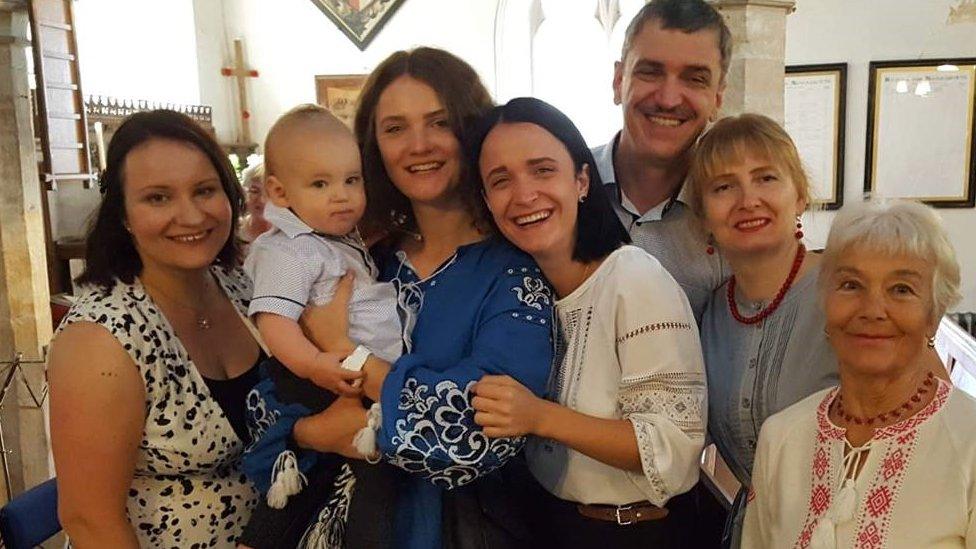 Tania Hebert, left, with her cousins and family at her son's christening