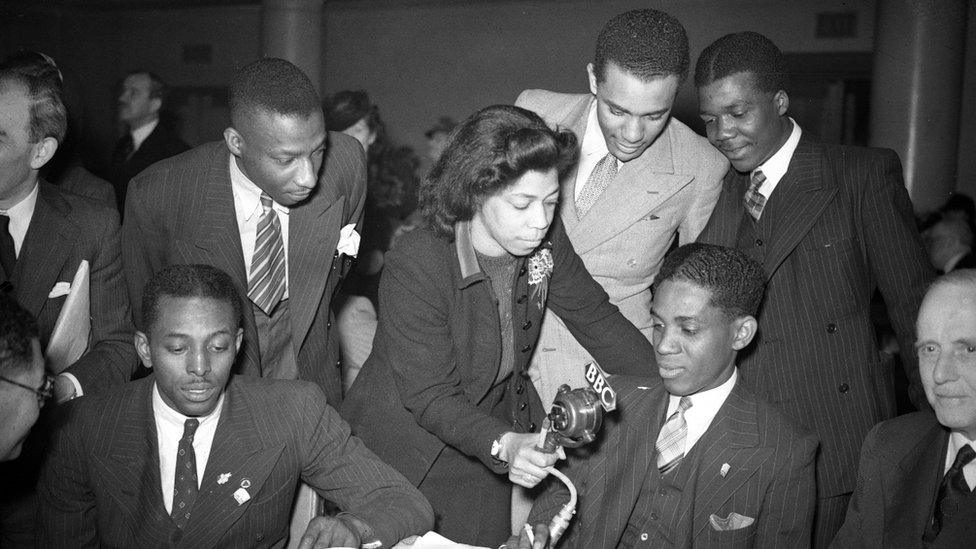 During a reception for Jamaican technicians who are working in factories in Britain, the BBC recorded messages from the men to their relatives at home, for transmission in the BBC's Service to the West Indies, 16th June 1942.