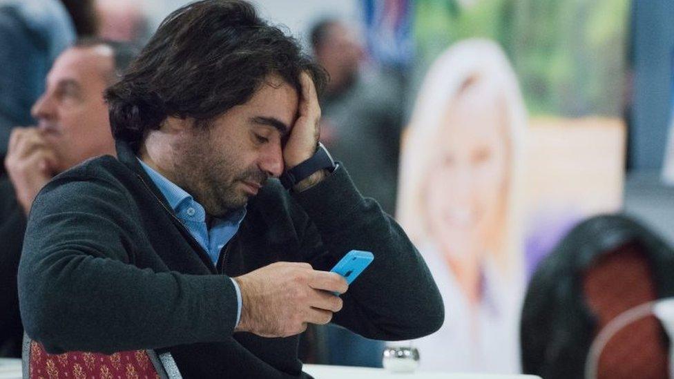 A National Front supporter reacts to first election results in Marseille. Photo: 13 December 2015