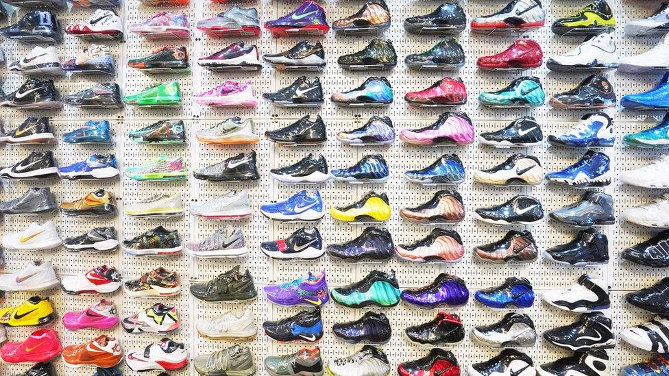 Sneakers on display at Stadium Goods specialist store in New York.