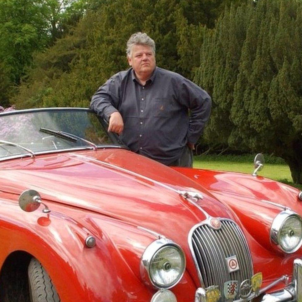 Robbie Coltrane with his Jaguar XK150