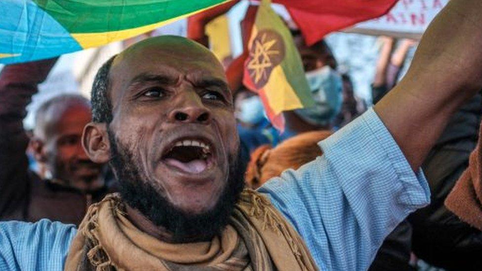 Man waving an Ethiopian flag