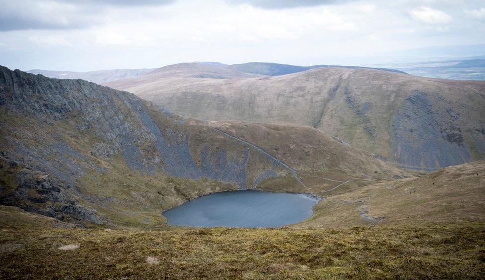 Scales Tarn glacial lake beneath Sharp Edge of Blencathra mountain