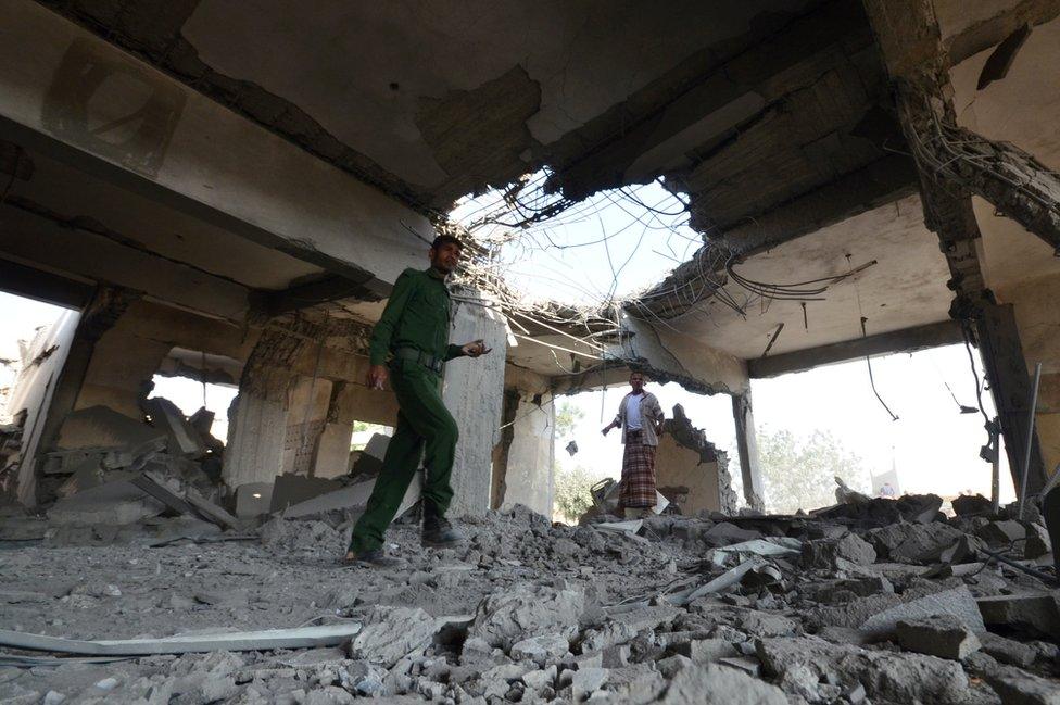 A policeman walks at a prison struck by Arab coalition warplanes in al-Zaydiyah district of the Red Sea port city of Hodeidah, Yemen October 30, 2016.