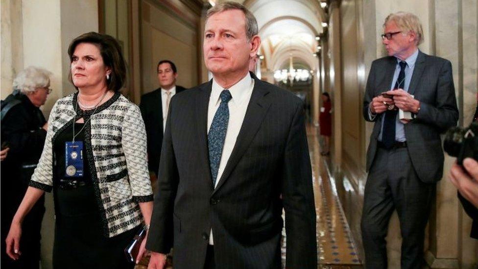 Chief Justice of the United States John Roberts leaves after presiding at the Senate impeachment trial of President Donald Trump