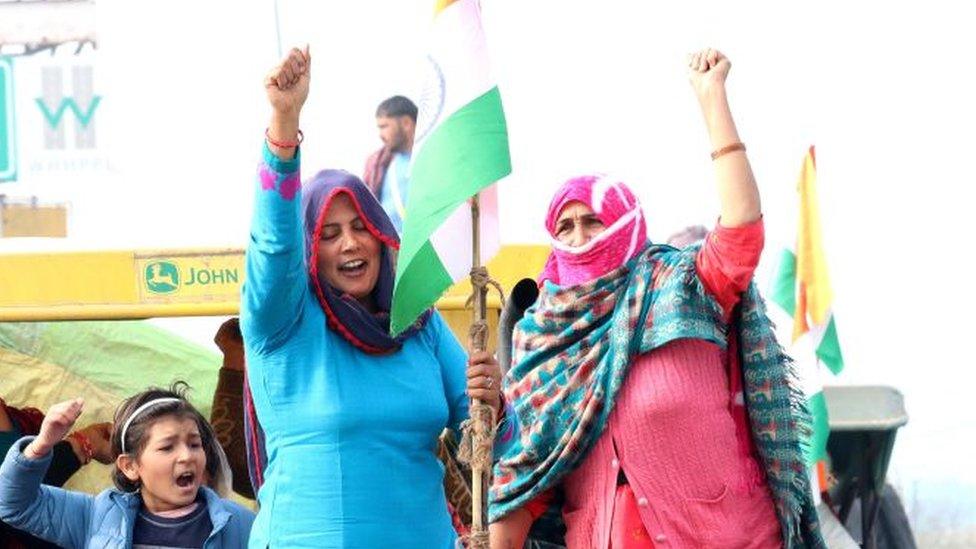 Women demonstrators rehearsing for the tractor rally proposed by farmers on Republic Day, near Sampla township in Rohtak district, on January 24, 2021 in Rohtak, India.