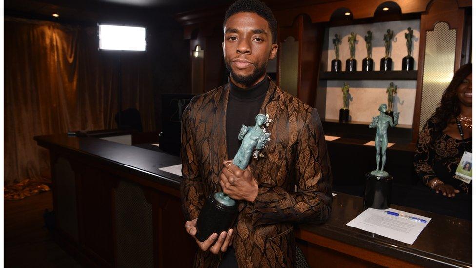 Chadwick Boseman, who plays T'Challa in the film, with his SAG award