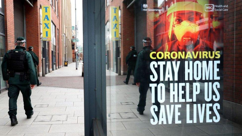 Undated handout photo issued by PSNI showing officers patrol Belfast city centre during the coronavirus lockdown