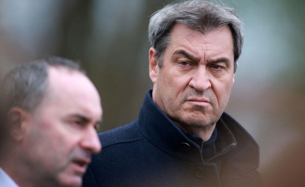 Bavarian economy minister Hubert Aiwanger (L) and Bavarian Premier Markus Soeder address the media after a visit to the Isar 2 nuclear power plant on April 13, 2023 in Essenbach, Germany