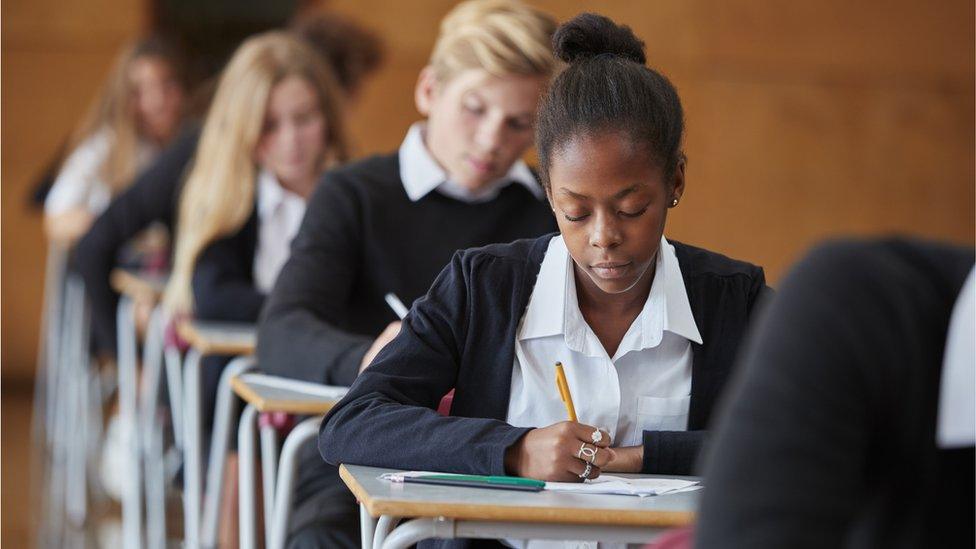 Children sitting an exam.