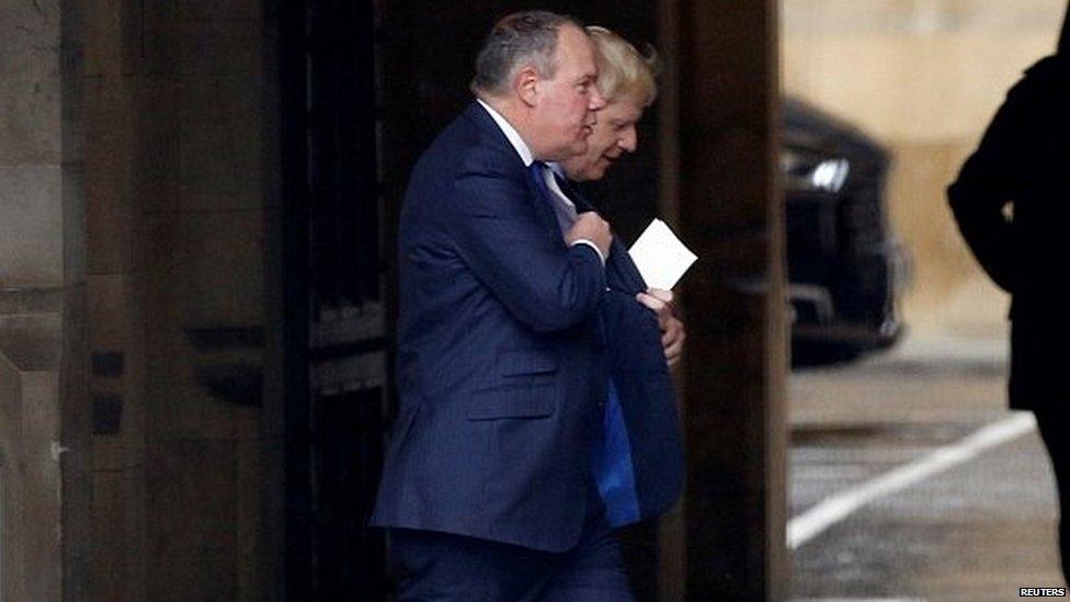 Boris Johnson walking alongside fellow Conservative MP Conor Burns