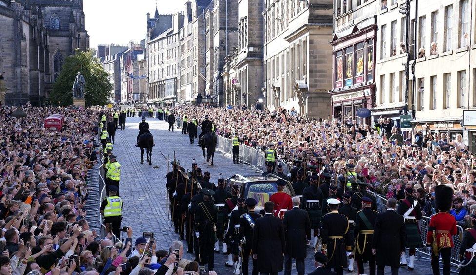 Thousands line the Royal Mile as the Queen's coffin is taken to St Giles' Cathedral