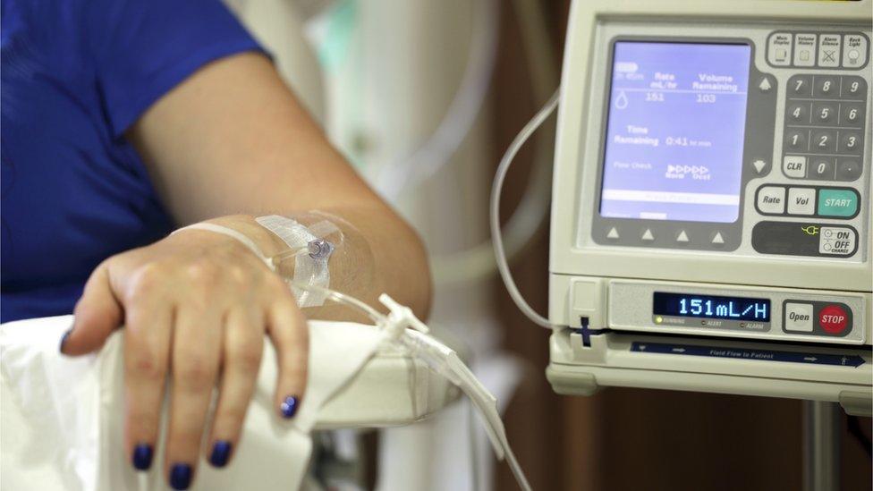 Patient with a chemo drip in her arm