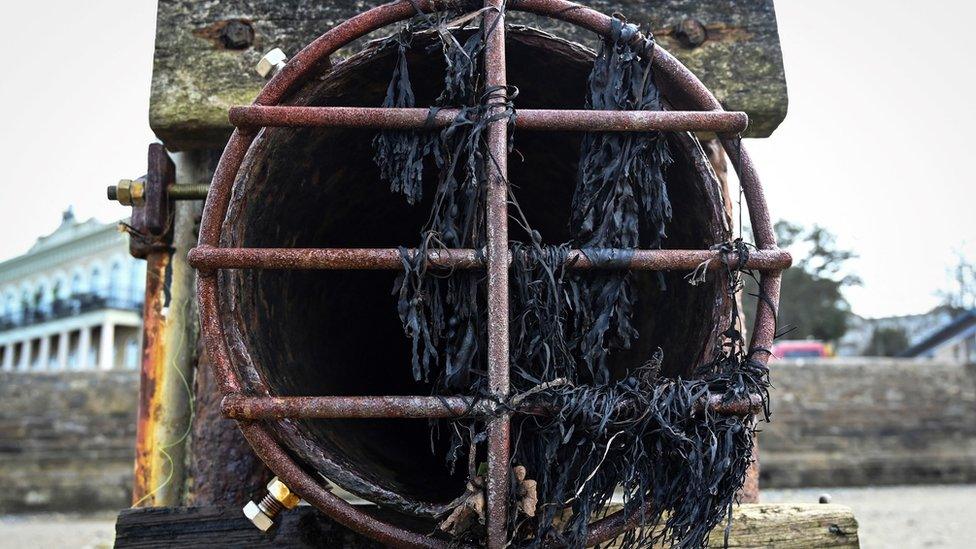 A photograph taken on March 30, 2023 shows a CSO (Combined Sewer Overflow) pipe on Ryde beach on the Isle of Wight which has suffered from sewage pollution in recent years caused by using a combined sewage overflow pipe