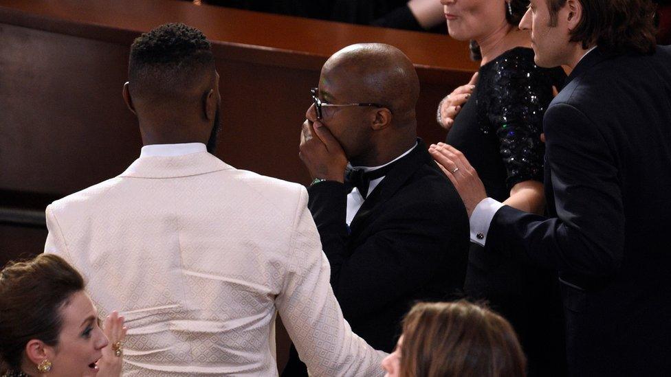 Barry Jenkins reacts as 'Moonlight' is announced as the true winner of best picture at the Oscars on Sunday, Feb. 26, 2017, at the Dolby Theatre in Los Angeles.