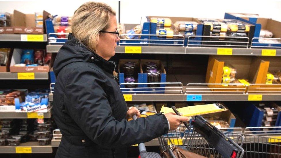 A woman shops for groceries