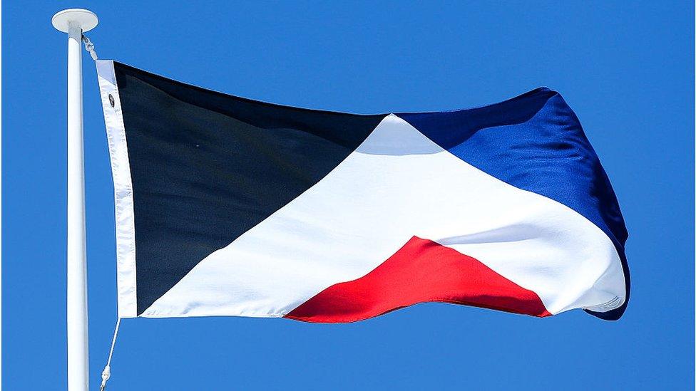 Red Peak, by Aaron Dustin, flies on top of the Wellington Town Hall on 12 October 2015 in Wellington, New Zealand