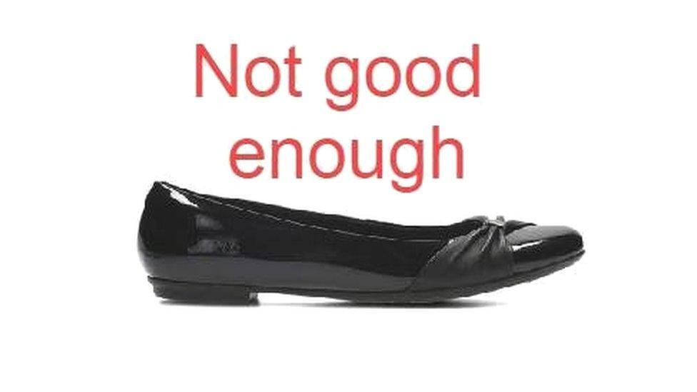 A shoe with the words 'not good enough' written above it