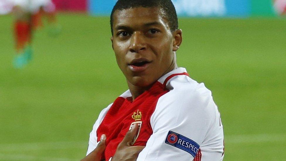 Kylian Mbappe celebrates his first