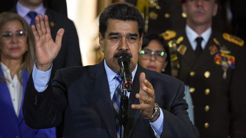 Venezuelan President Nicolas Maduro speaks outside the Presidential Palace in Caracas