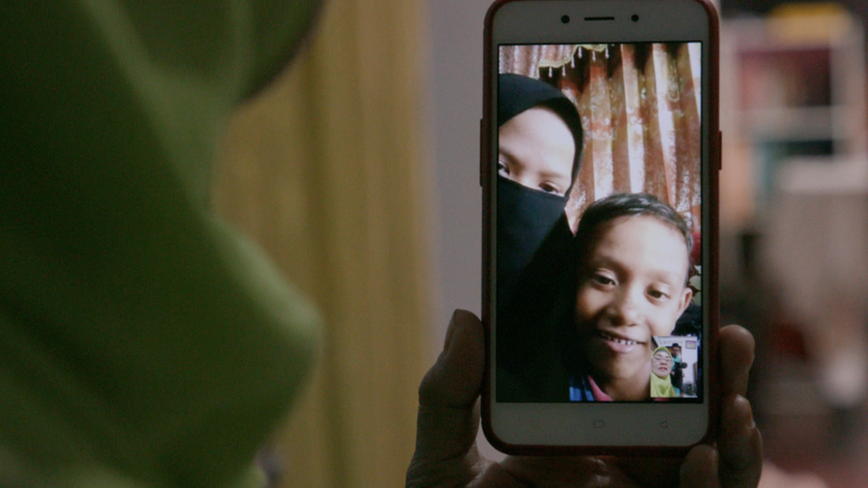 Fikri video calling his grandmother