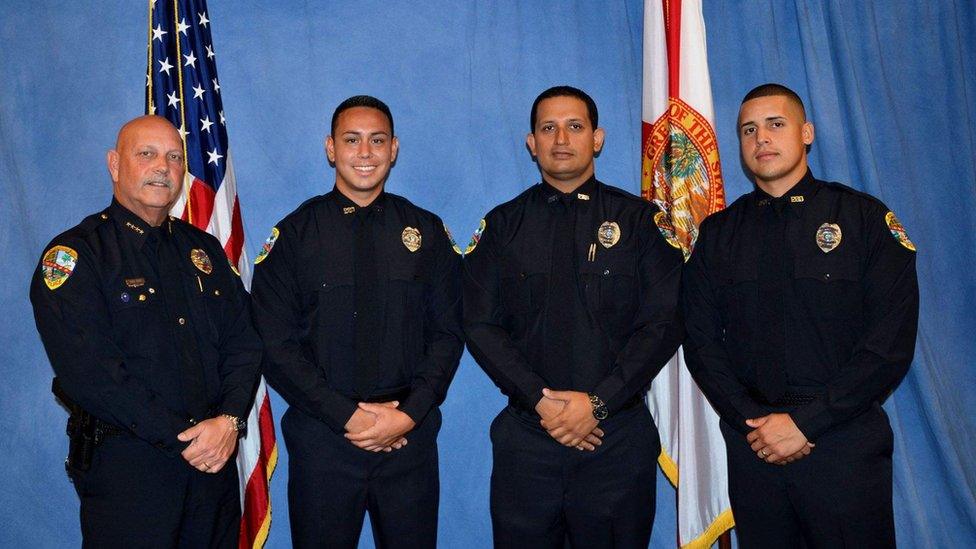 Officer Raja (second from right) was fired shortly after the shooting