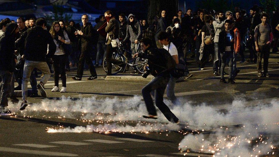 Tear gas is used on protesters in Paris