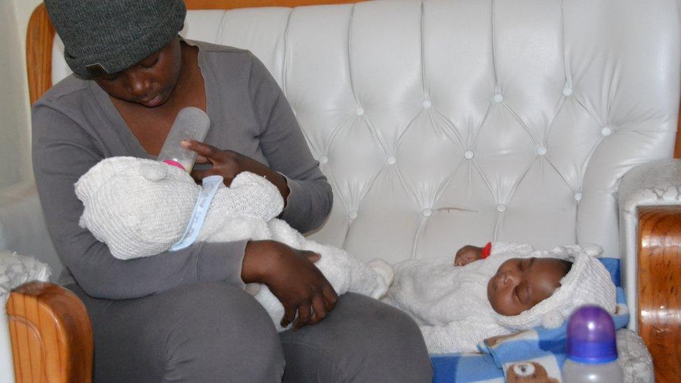 Kholofelo Moholola with her two children, Tshiamo and Neo