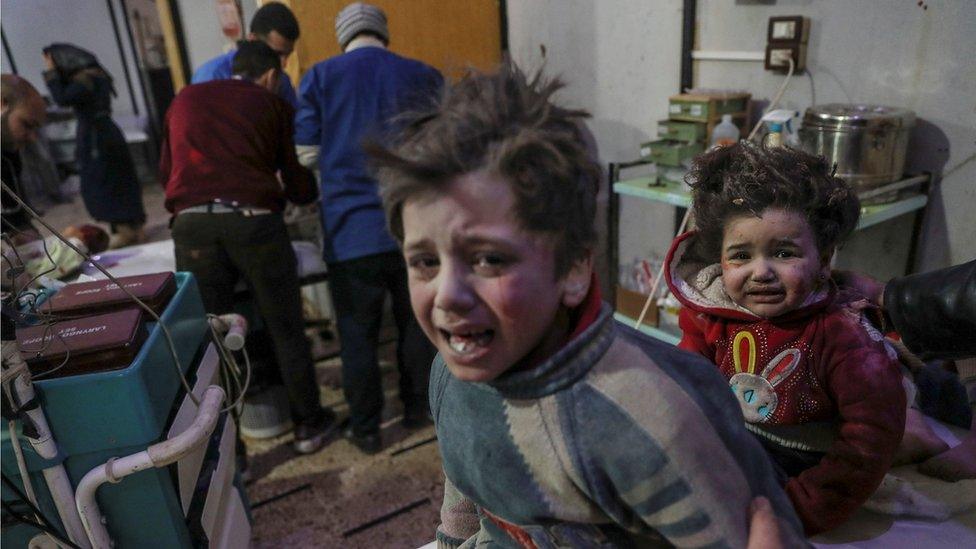 Injured children are treated at a hospital in rebel-held Douma, Eastern Ghouta, Syria, 19 February 2018