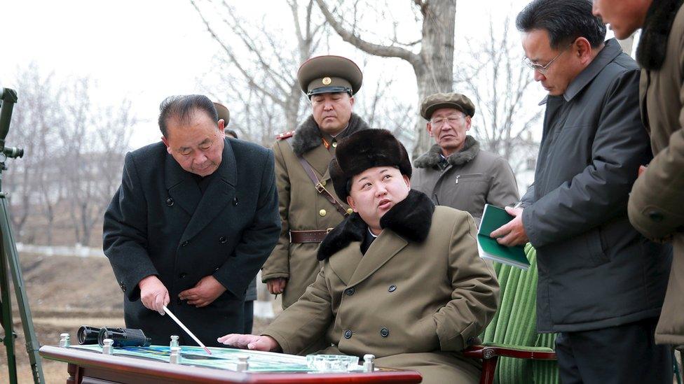 The North Korean leader gives instructions during a simulated test of atmospheric re-entry of a ballistic missile