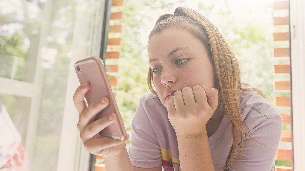 Teenager on phone